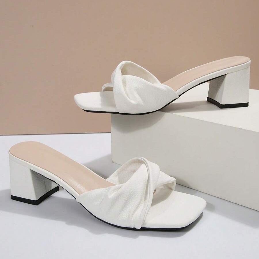 Twist Knot Block Mid Heel Sandals in Pink - Angled View