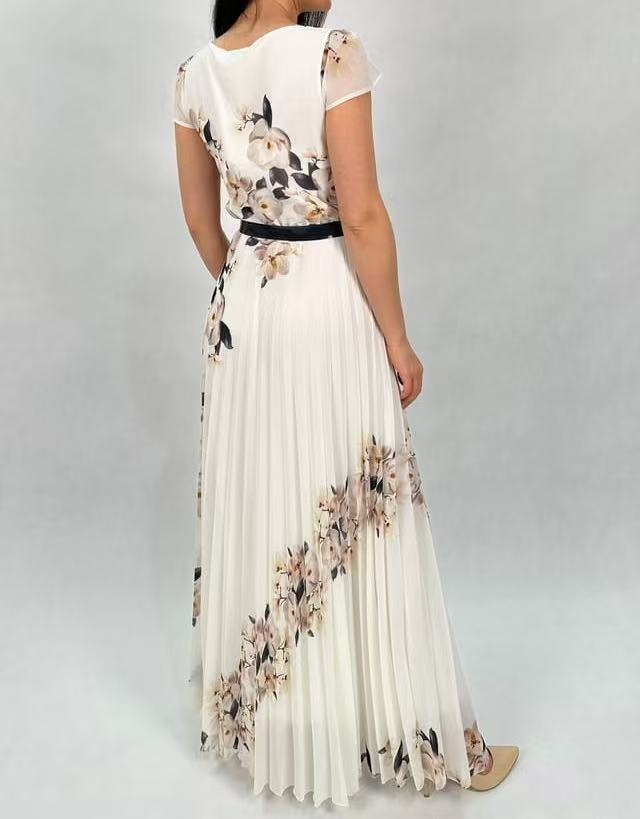 🌺 SPÓDNICA MAXI PLISOWANA Z KWIATOWYM NADRUKIEM – ROMANTYCZNY HIT SEZONU!