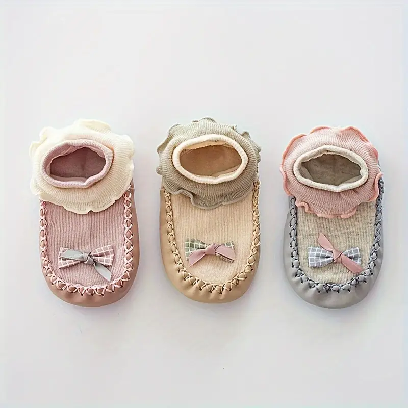 soft non slip walkers shoes with bow accent beige non toxic soles for toddlers learning to walk infant floor socks for boys girls ideal birthday or christmas gift toddler walking aid stylish toddler footwear comfortable toddler footwear new parents 3