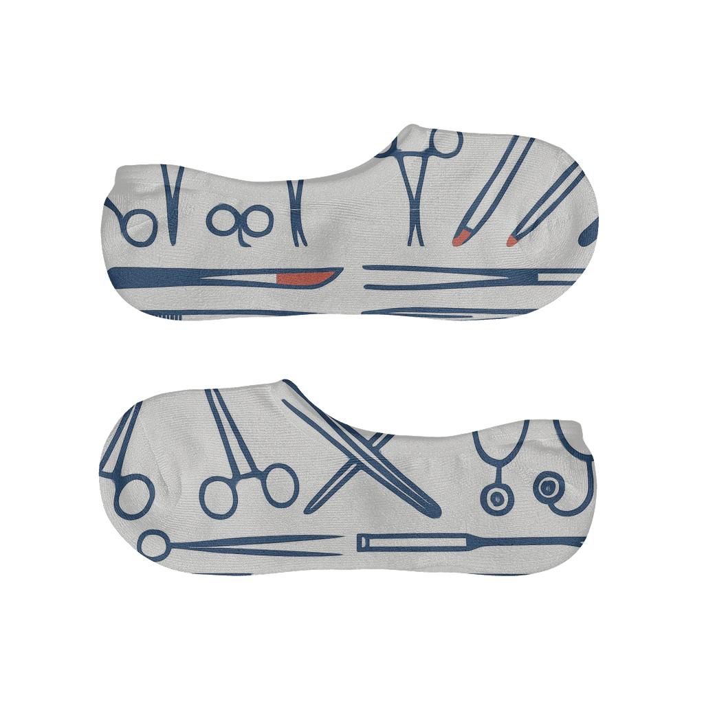 Instrument Bands On Sterile White Background With Surgeon low cut no-show socks