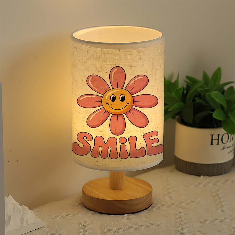 A Modern USB-powered Linen Table Lamp With Creative Patterns Perfect For Bedside Decoration