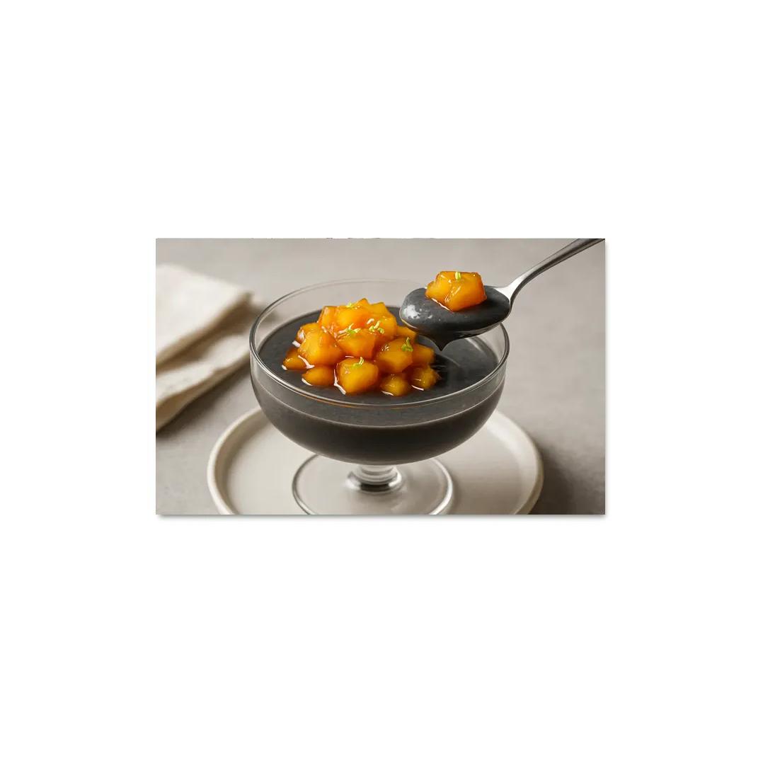 Black Sesame Coconut Pudding With Caramelized Pineapple And Lime Zest decor