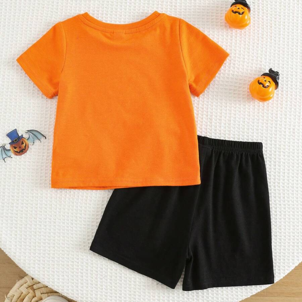 Two Piece Short Sleeve Slogan T Shirt And Camo Shorts Set For Babies
