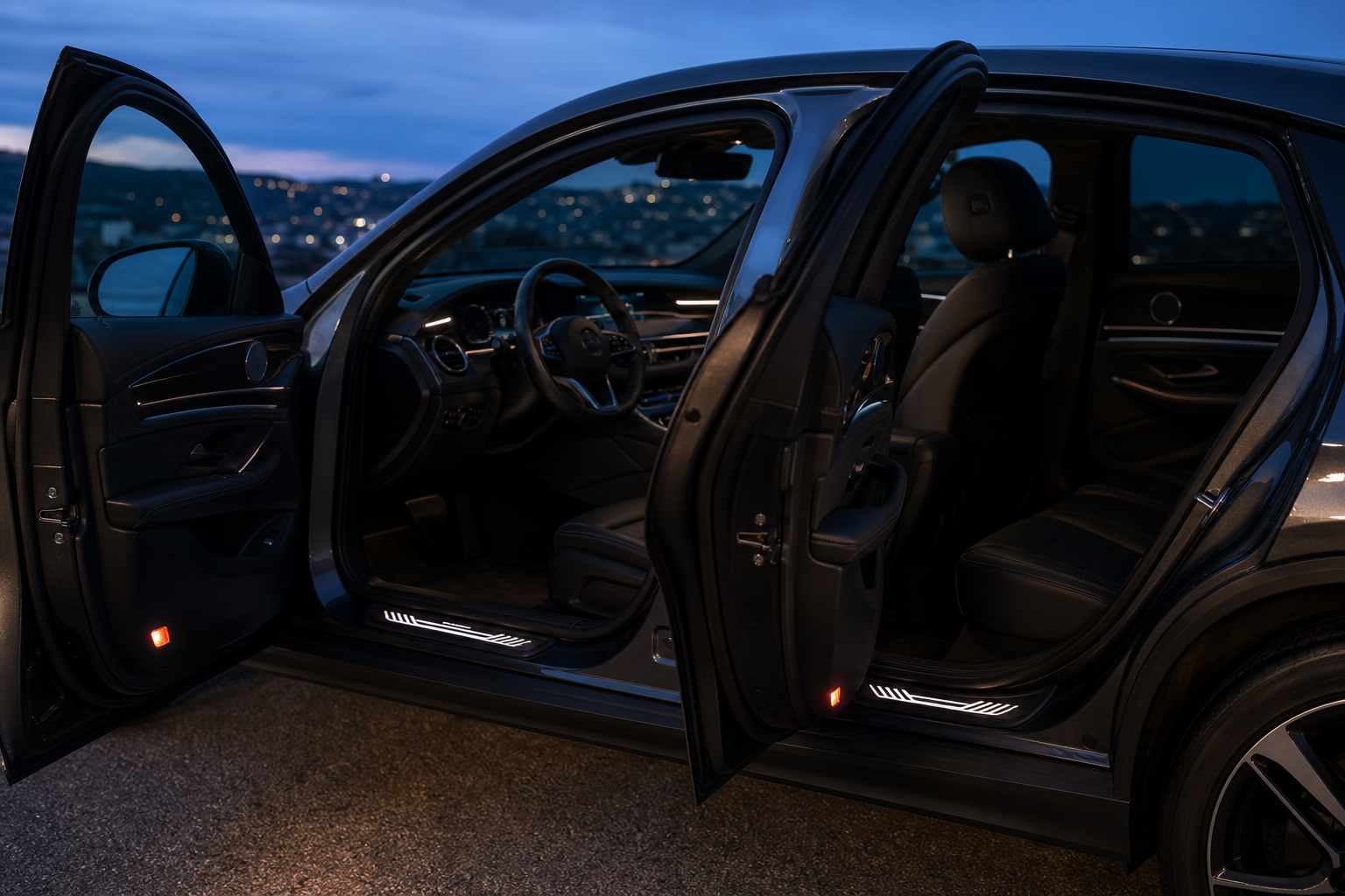 Front and rear LED sill plates illuminated on a four-door car