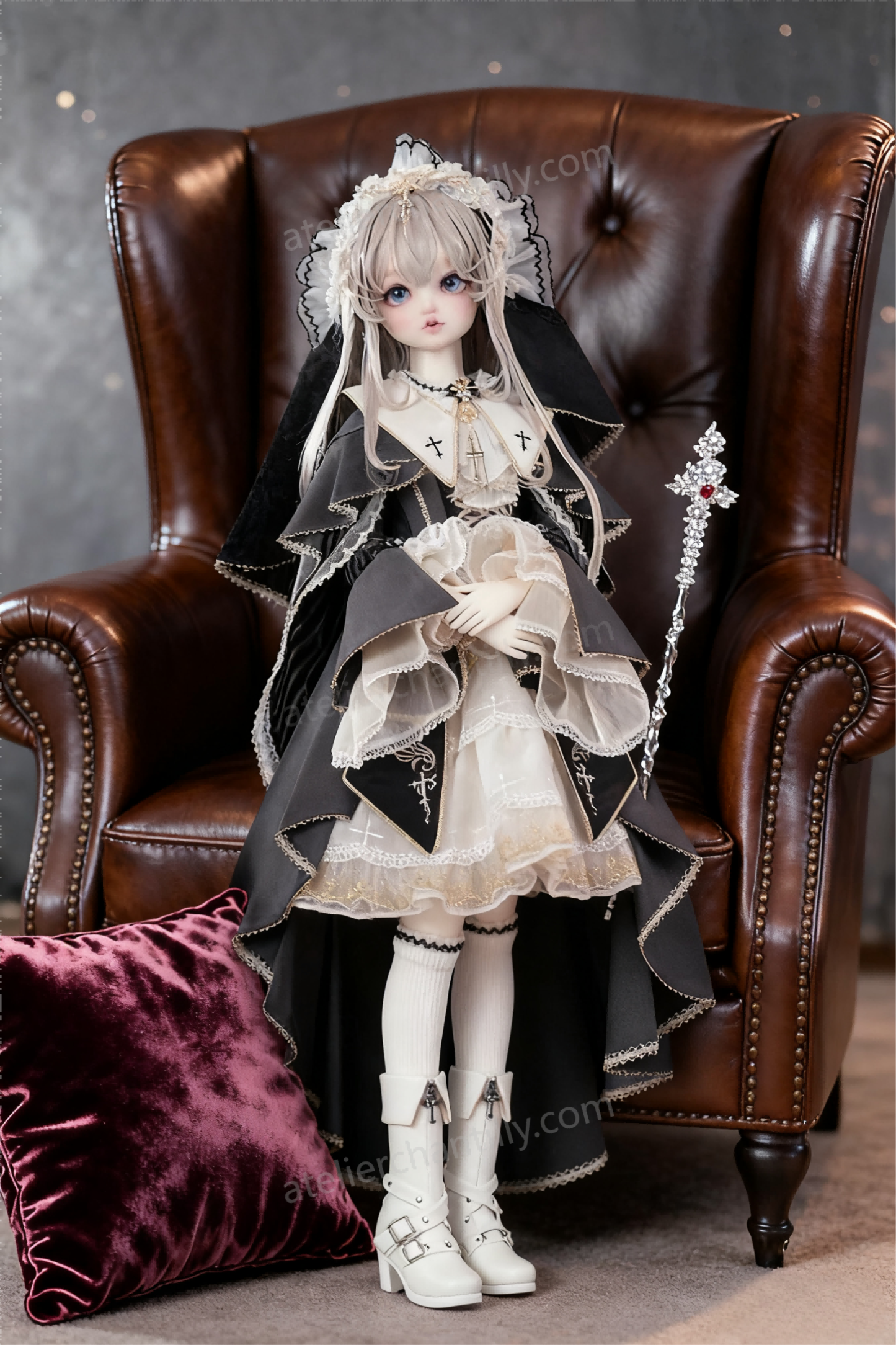 Gothic religious Lolita outfit for 1/4 BJD dolls on a brown leather armchair - Atelier Chantilly