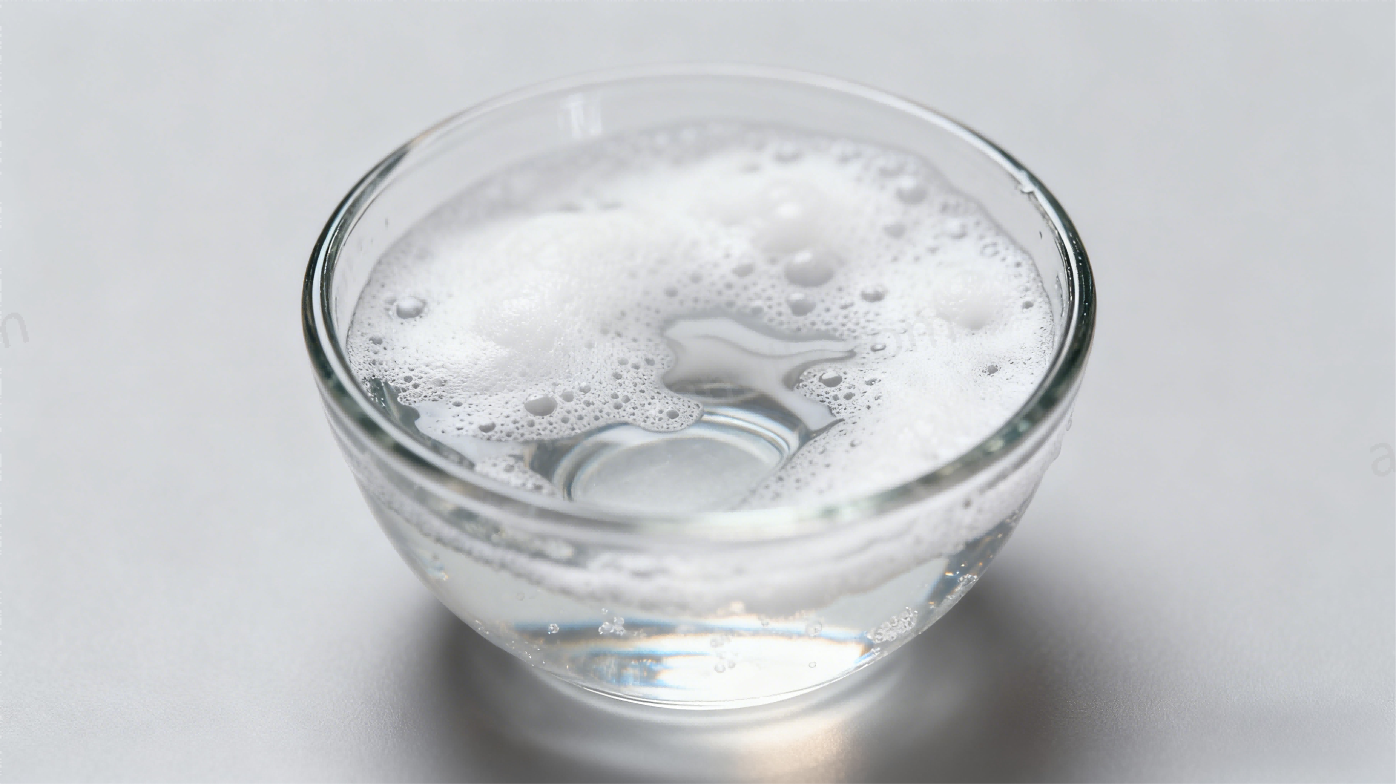 Bowl with diluted shampoo for BJD wig cleaning