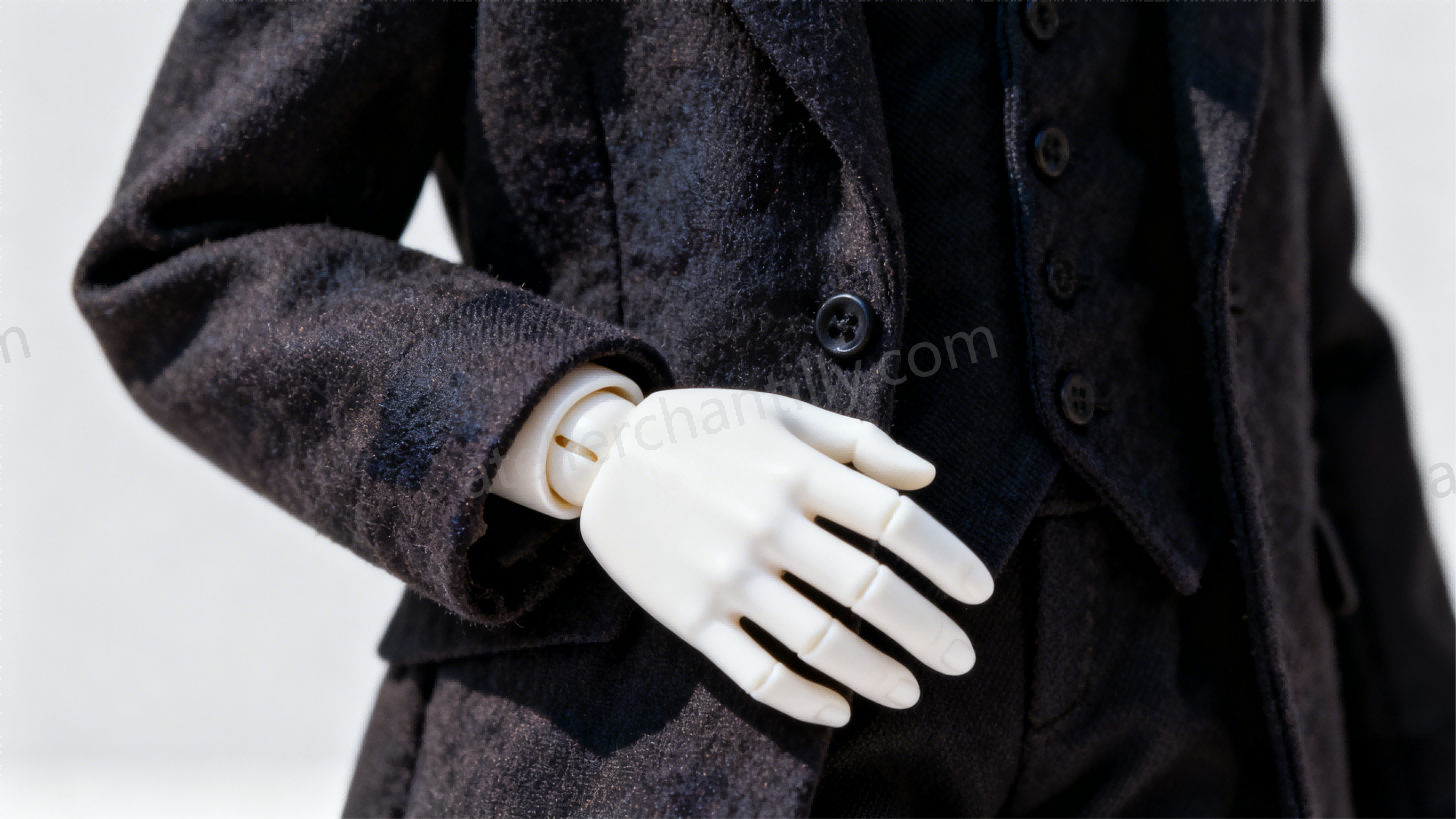 Dark clothes shown next to resin doll highlighting stain risk