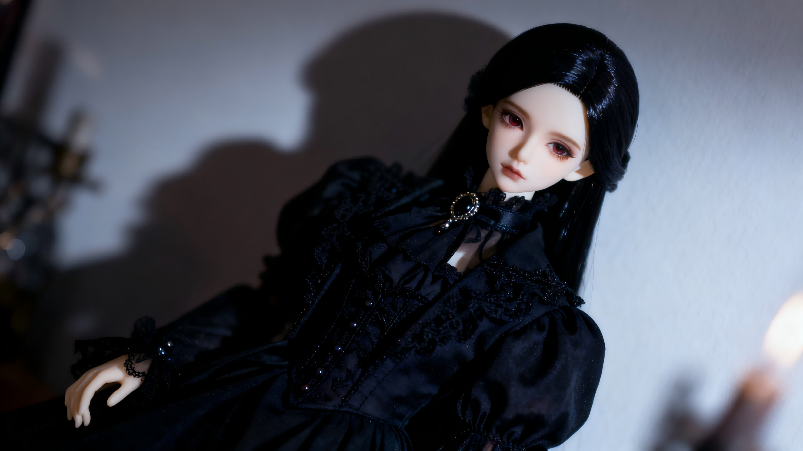 Gothic BJD doll styled for dramatic photography