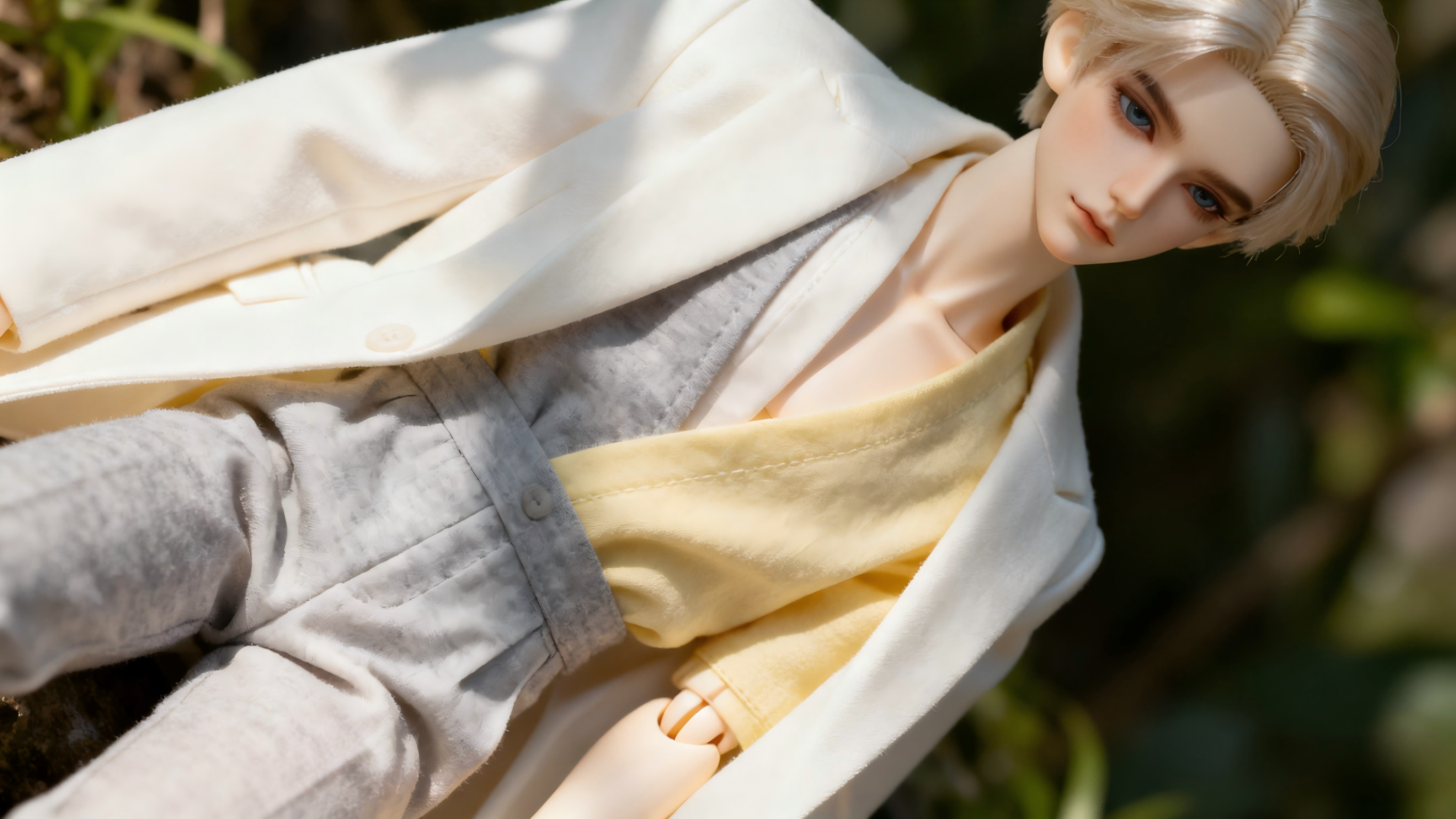BJD doll dressed in neutral tone outfit with elegant and clean fashion style