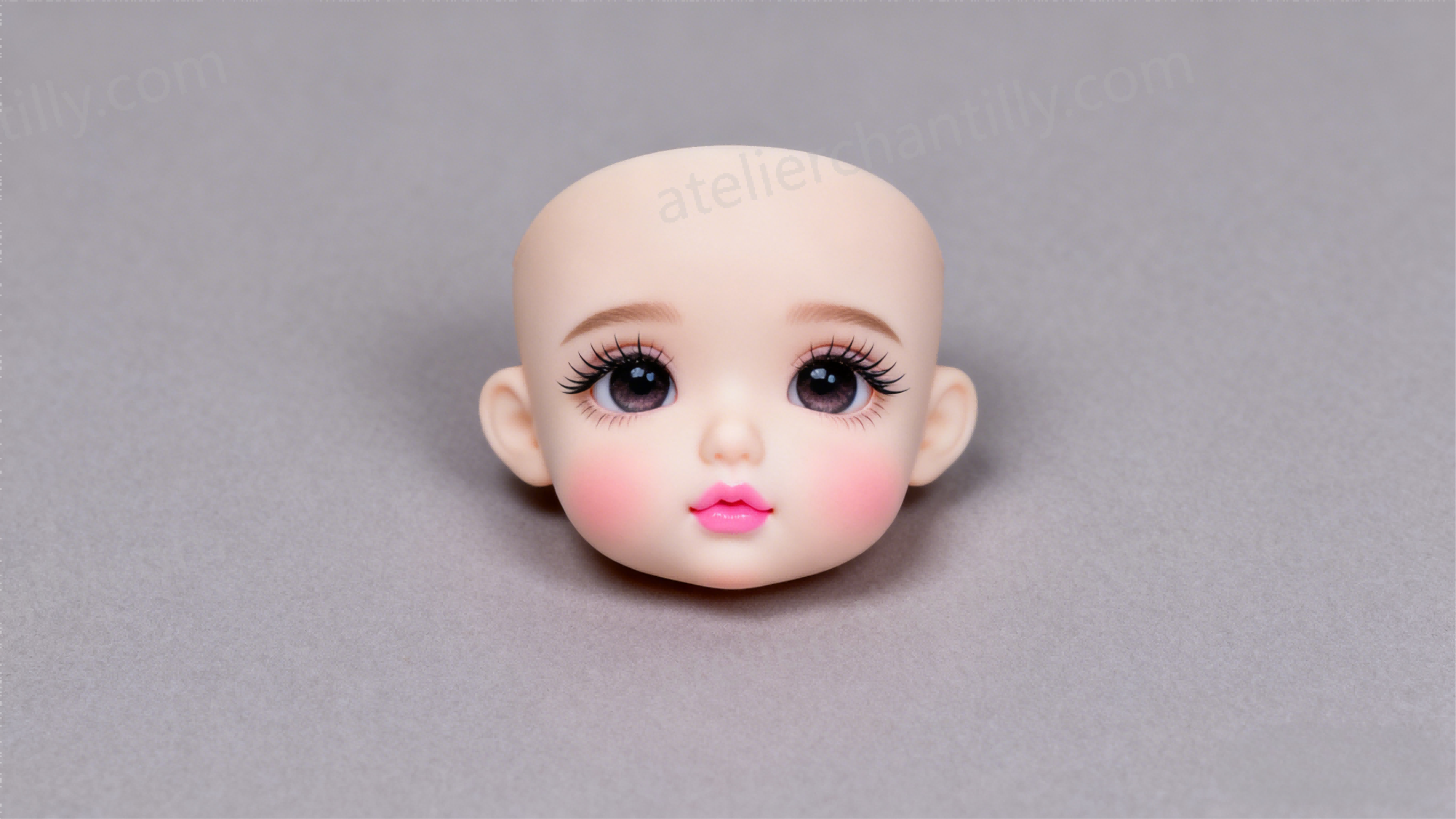Comparison of BJD doll head sculpts in different aesthetic styles