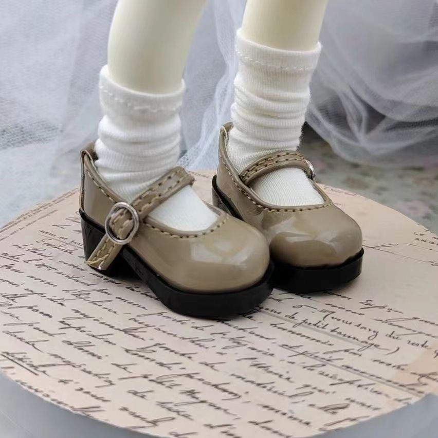 ** Brown glossy BJD Mary Jane shoes with bows