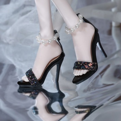 *Side profile of black sequin pearl strap BJD doll heels*