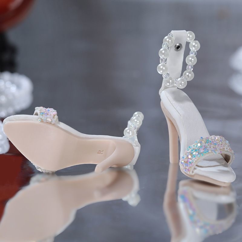 *Close-up of black sparkling sequin heels for BJD dolls*