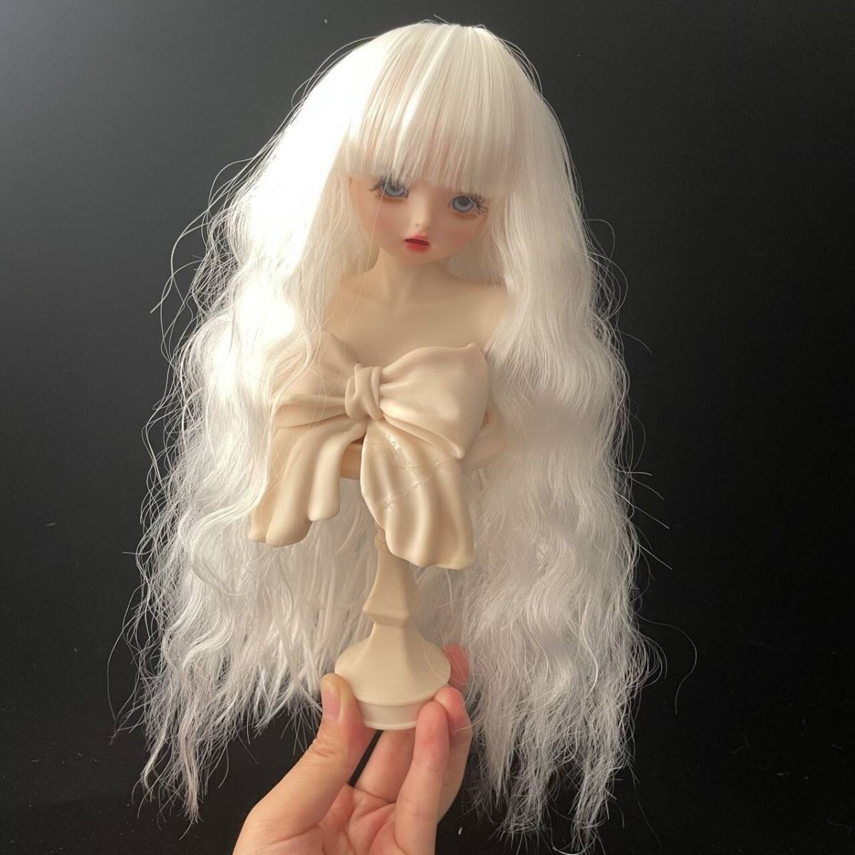 Back view of long white wavy BJD doll wig – realistic doll hair