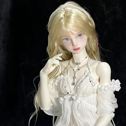 Close-up of soft natural fiber BJD wig with deep brown color and full texture