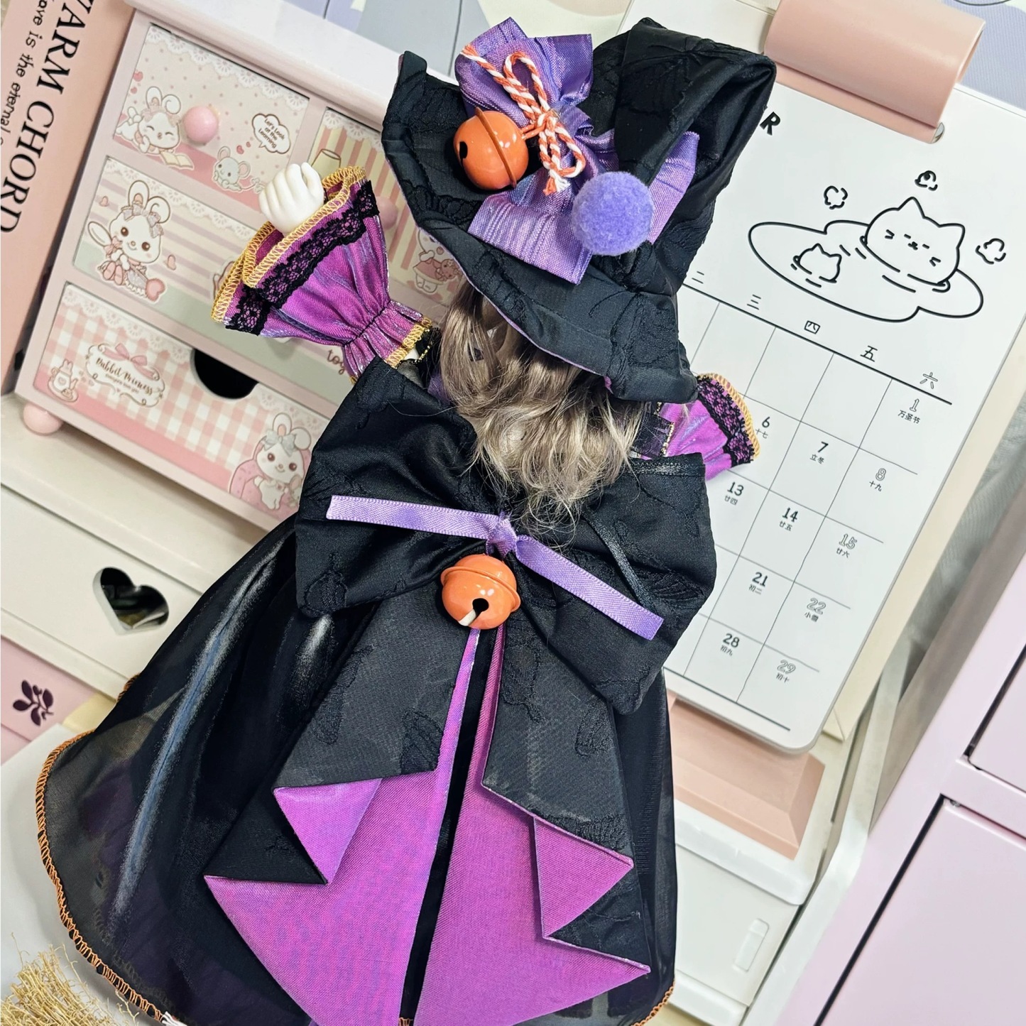 1/6 BJD doll in witch dress, back view with purple-black bow and bell charm - Atelier Chantilly