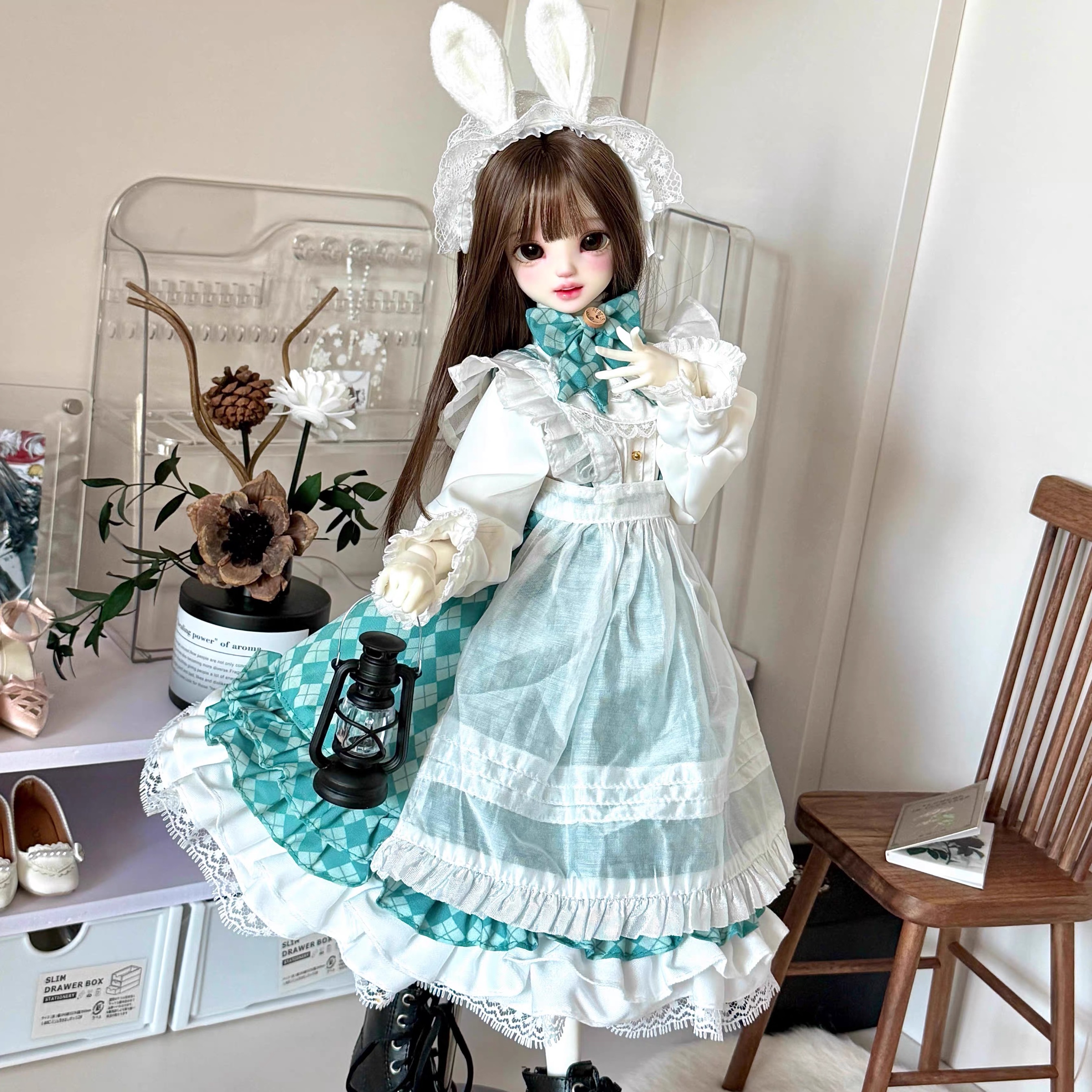 1/4 BJD doll in mint green bunny Lolita outfit holding a small lantern - Atelier Chantilly