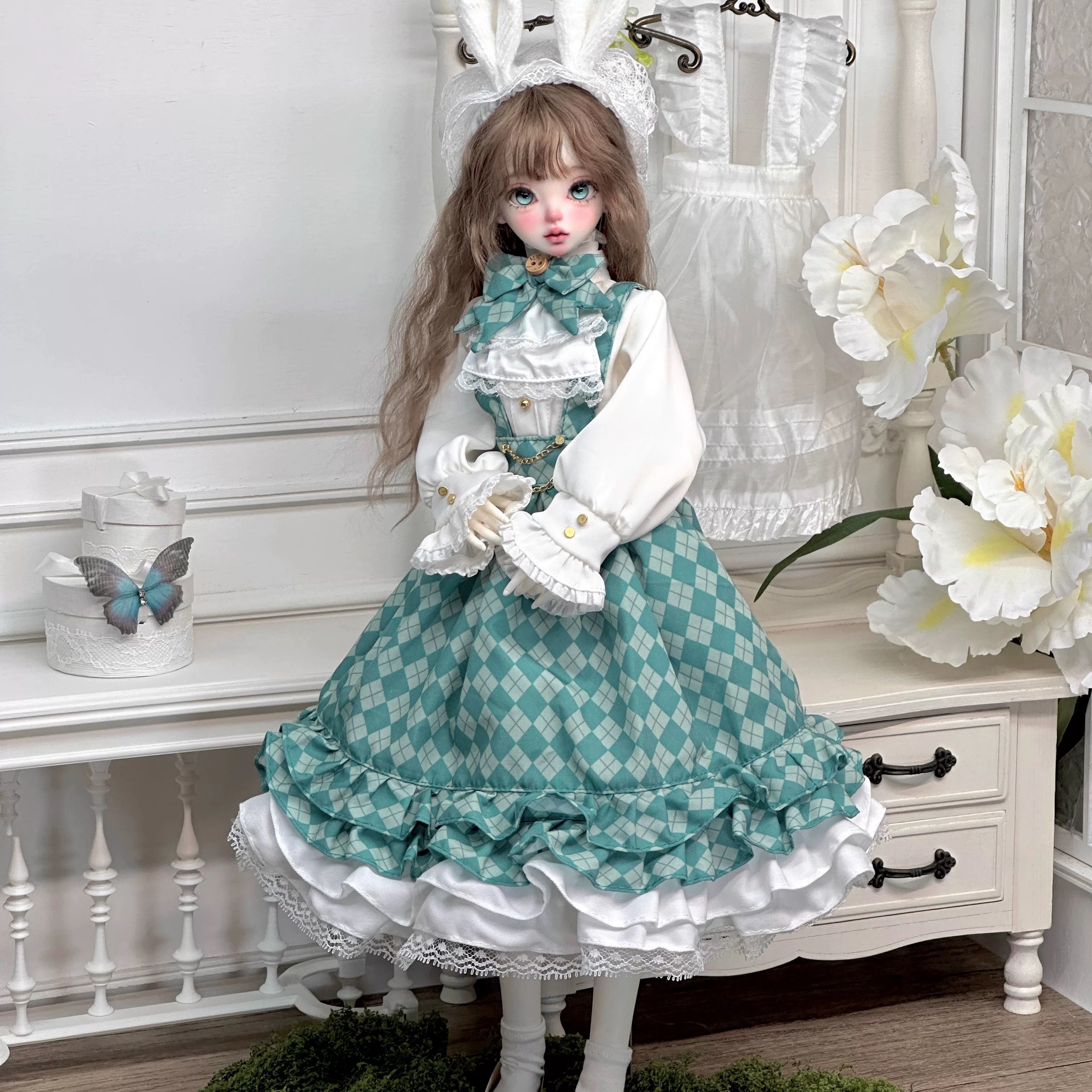 1/4 BJD doll showcasing mint green Lolita outfit with fluffy rabbit-ear headpiece - Atelier Chantill