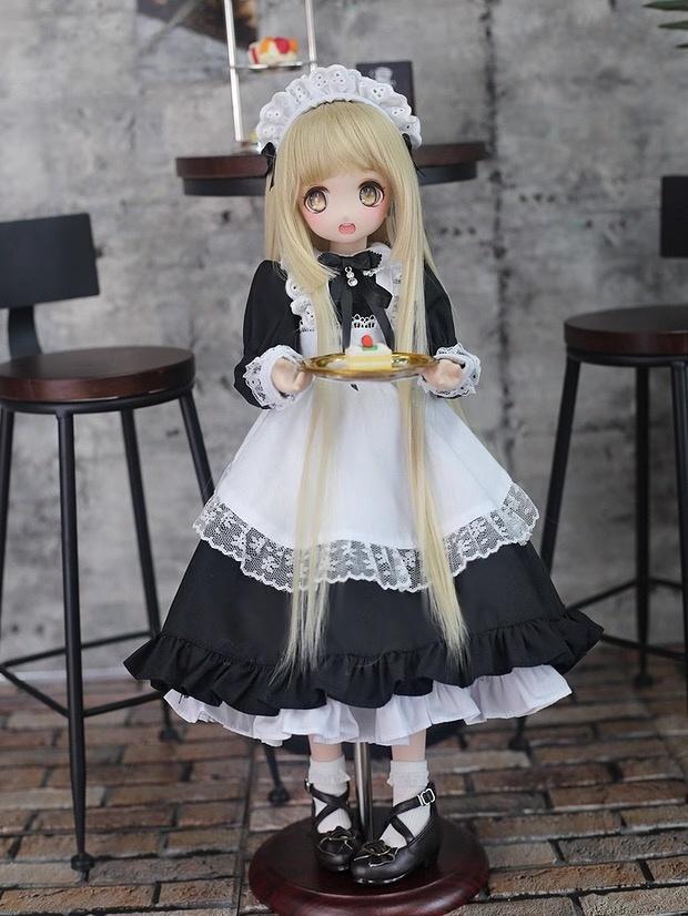 1/4 BJD doll in black white maid outfit holding a dessert tray at a café - Atelier Chantilly