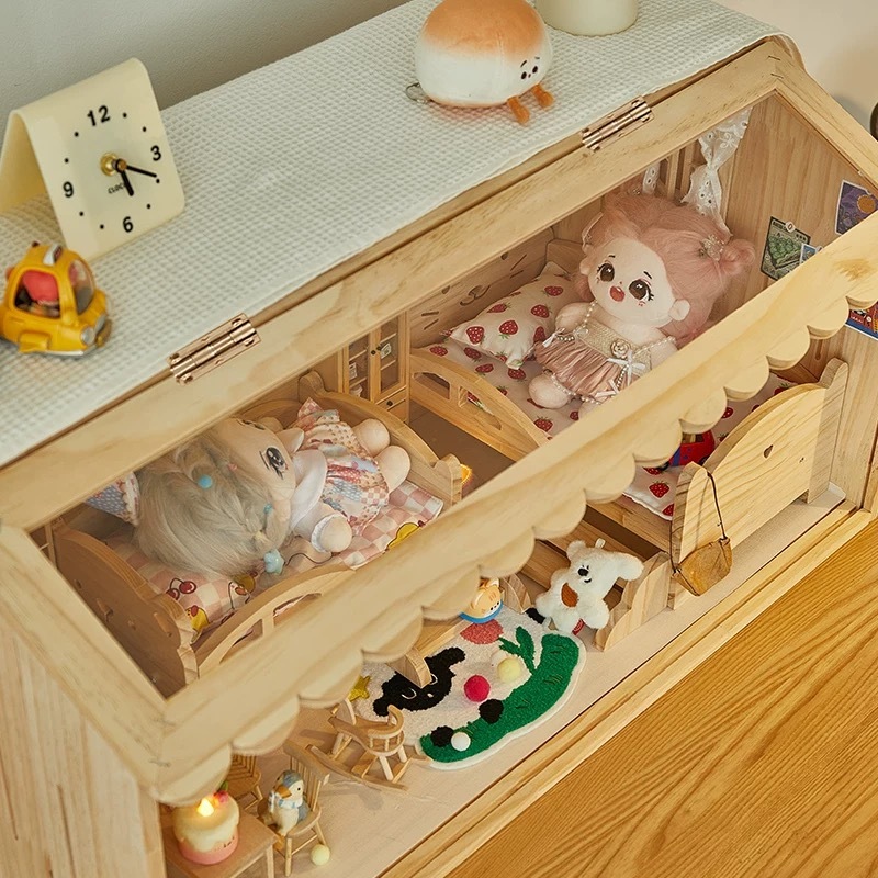Angled view of wooden BJD doll house with twin beds and mini rug - Atelier Chantilly