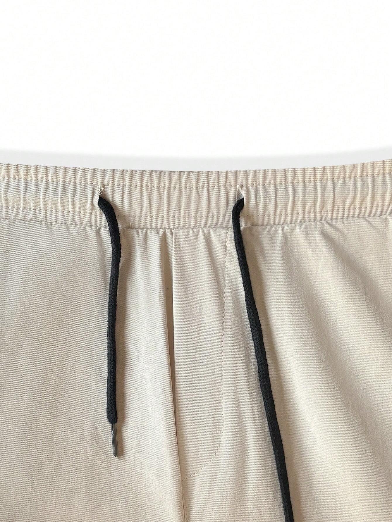 Loose Fit Drawstring Cargo Pants With Flap Pockets