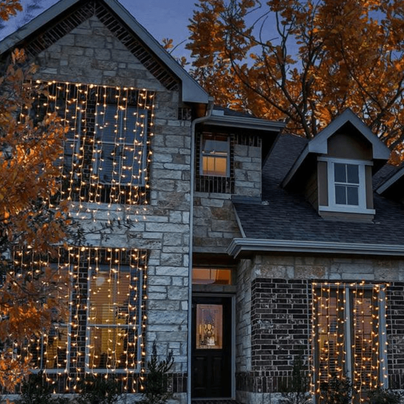 10ft 300 Warm White Water-Resistant Curtain Lights - Solar Flame Torch