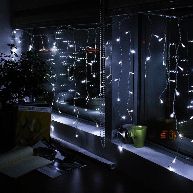 10ft 300 Warm White Water-Resistant Curtain Lights - Solar Flame Torch