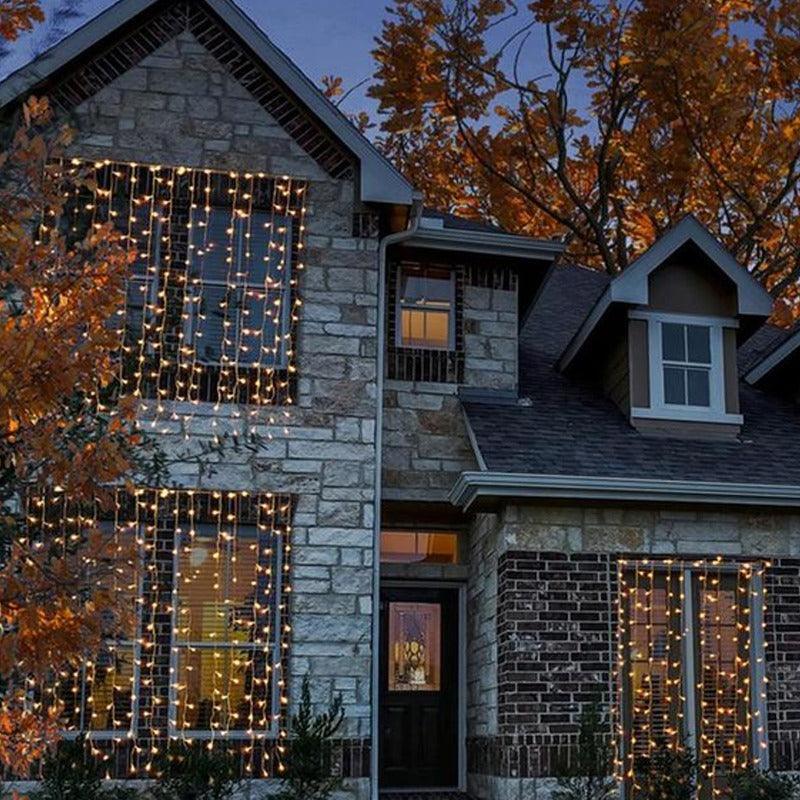 10ft 300 Warm White Water-Resistant Curtain Lights - Solar Flame Torch