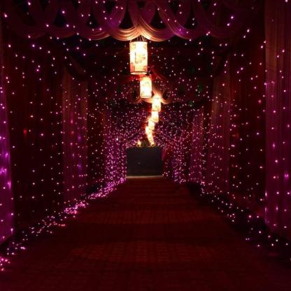 10ft 300 Warm White Water-Resistant Curtain Lights - Solar Flame Torch