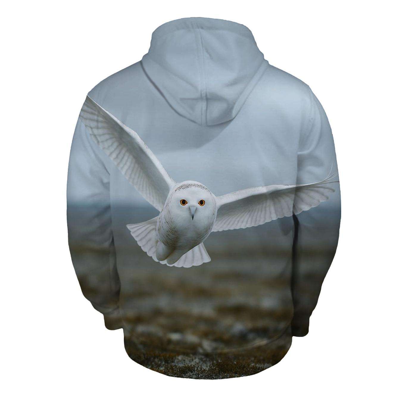 Snowy Owl Over Tundra heavyweight hoodies