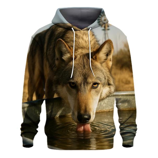 High Desert Wolf Drinking At A Windmill Tank heavyweight hoodies