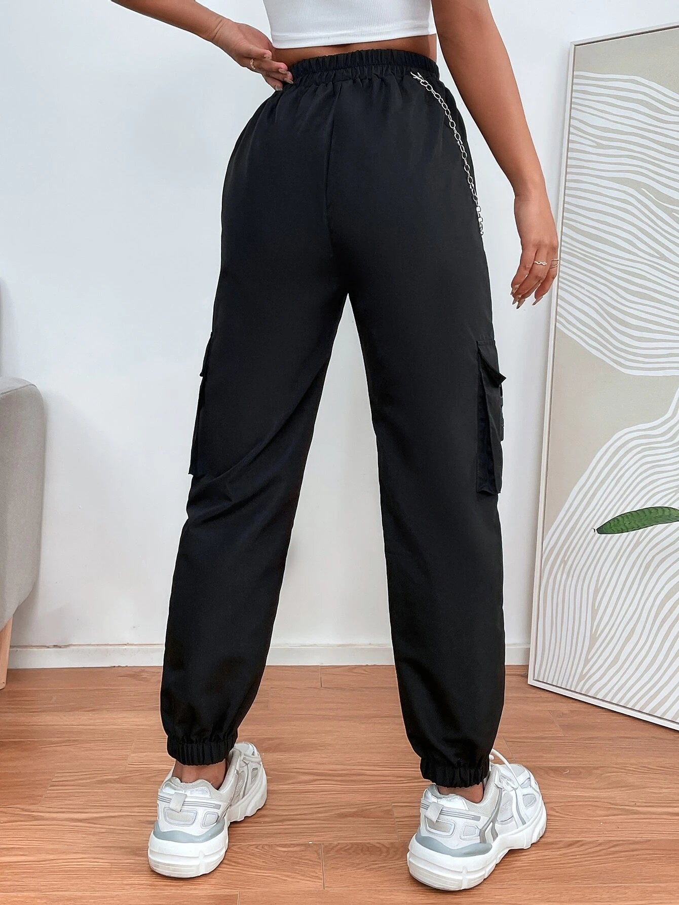 Chain Detail Flap Pocket Buckle Pants – side profile view