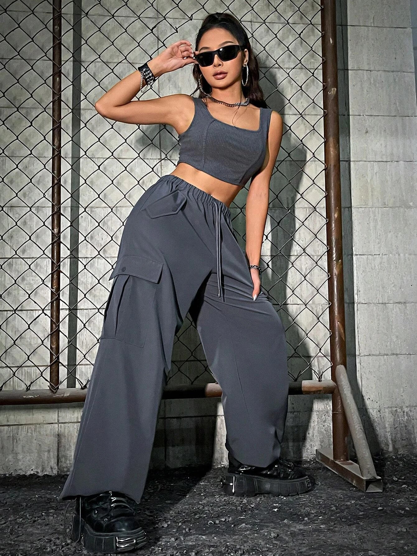 Tank Top And Flap Pocket Cargo Pants – side profile view