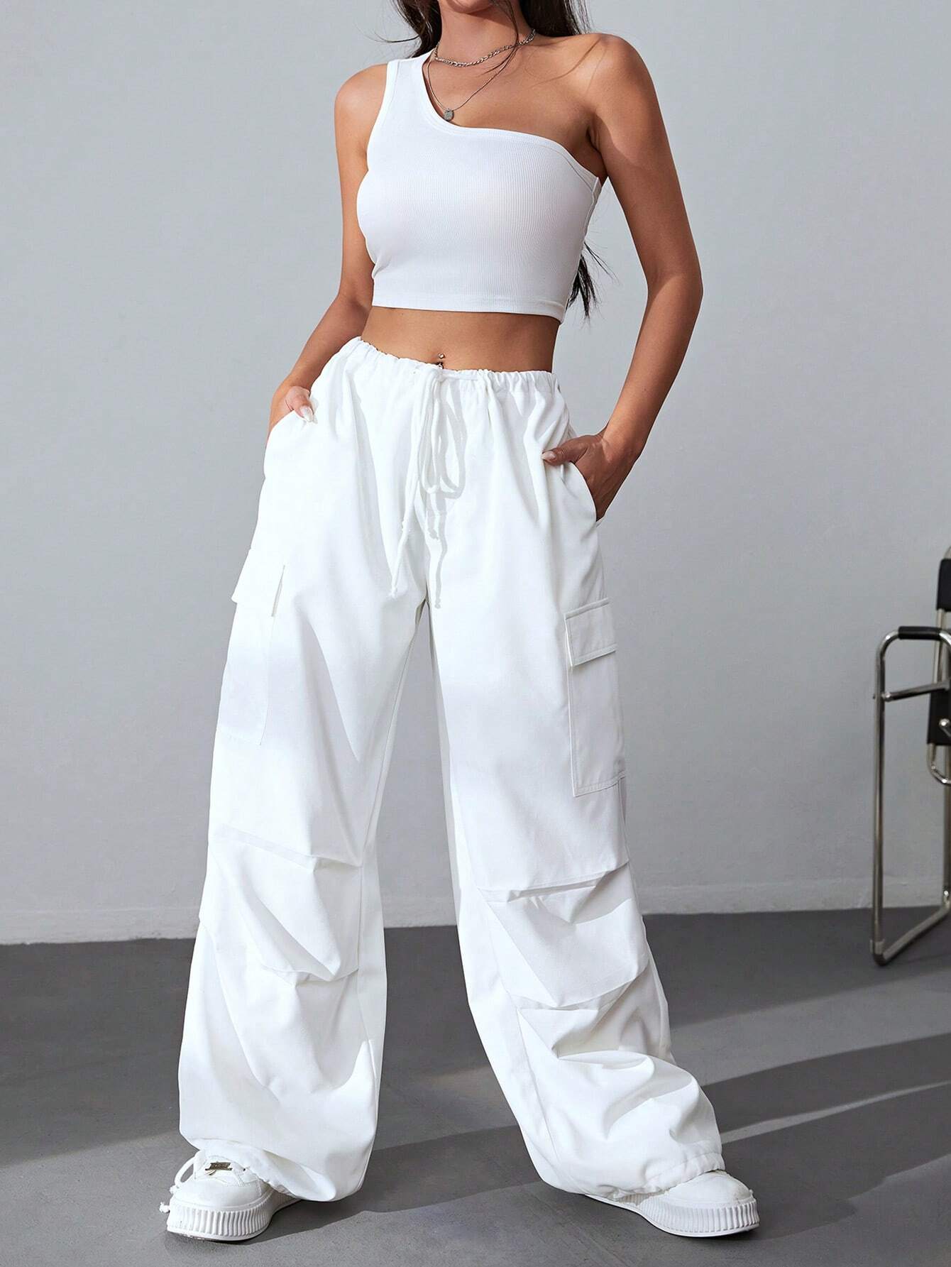 One Shoulder Top And Drawstring Cargo Pants – side profile view