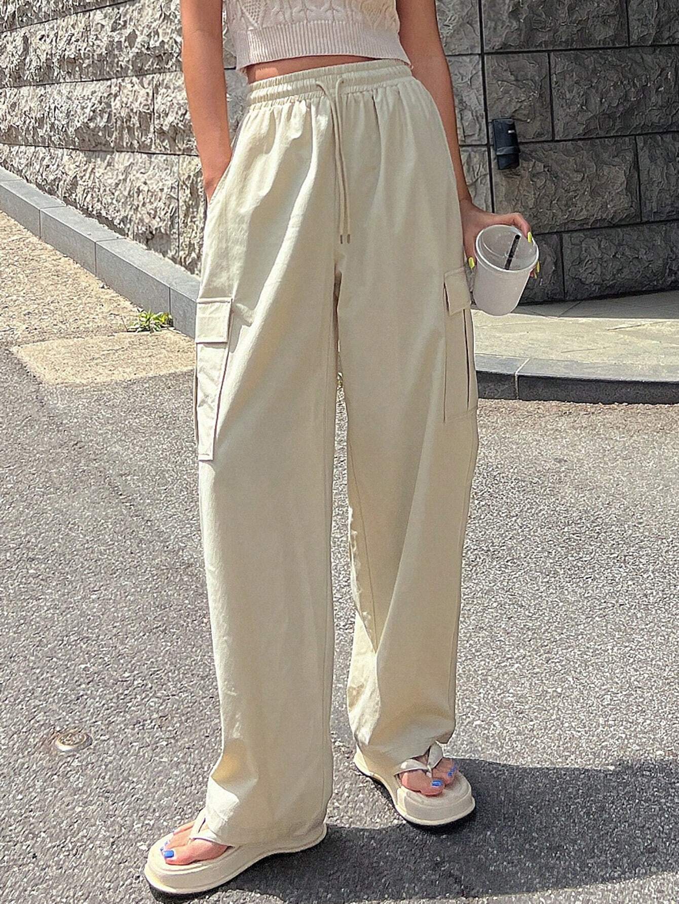 Solid Color Drawstring Waist Flap Pocket Side Cargo Pants – model wearing view