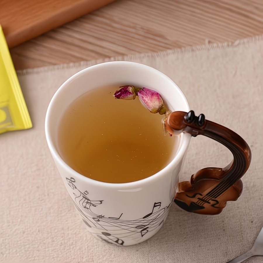 A 8.45oz Ceramic Mug Shaped Like a Violin Handle