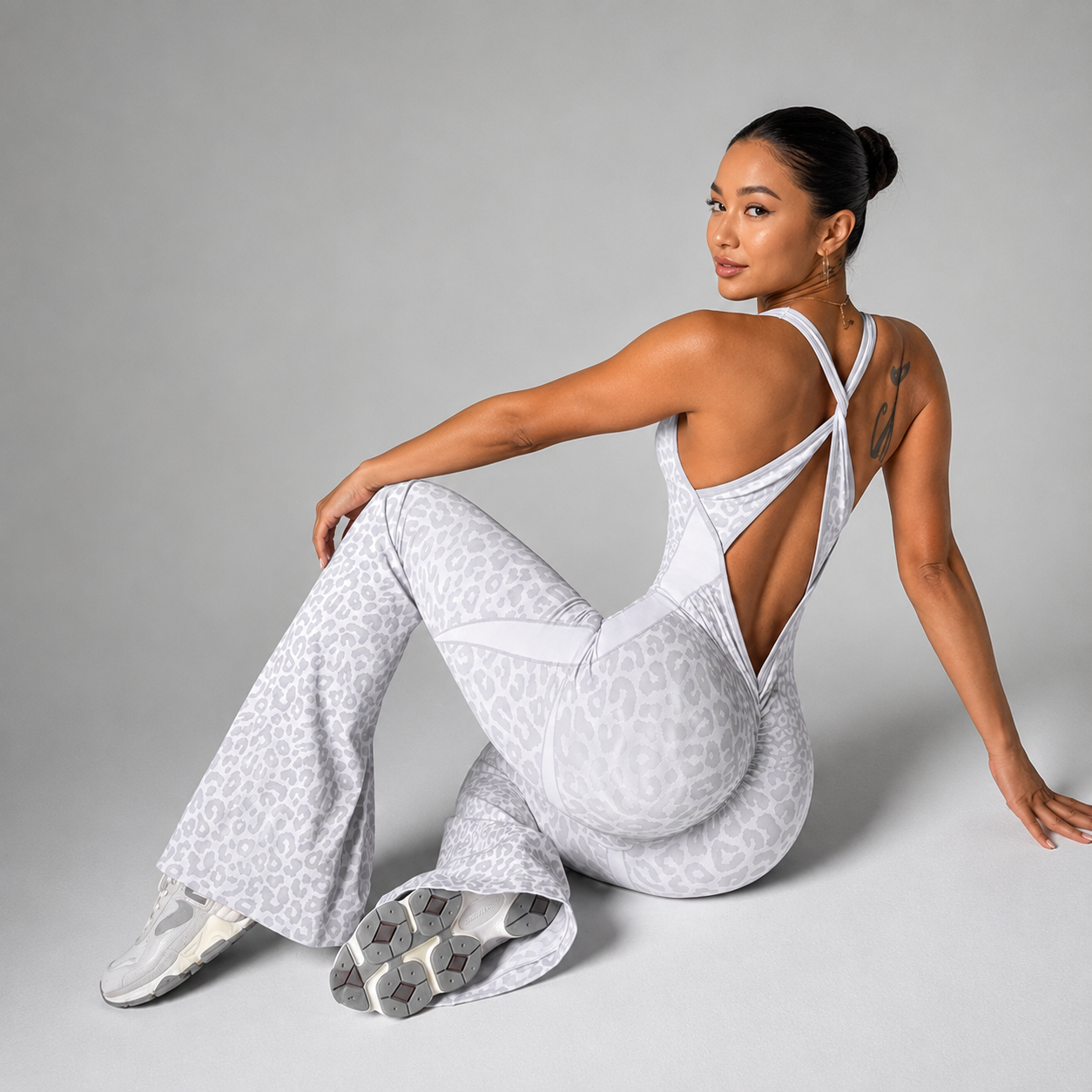 Leopard Print Flared Sports Jumpsuit With Cross Back Design For Women