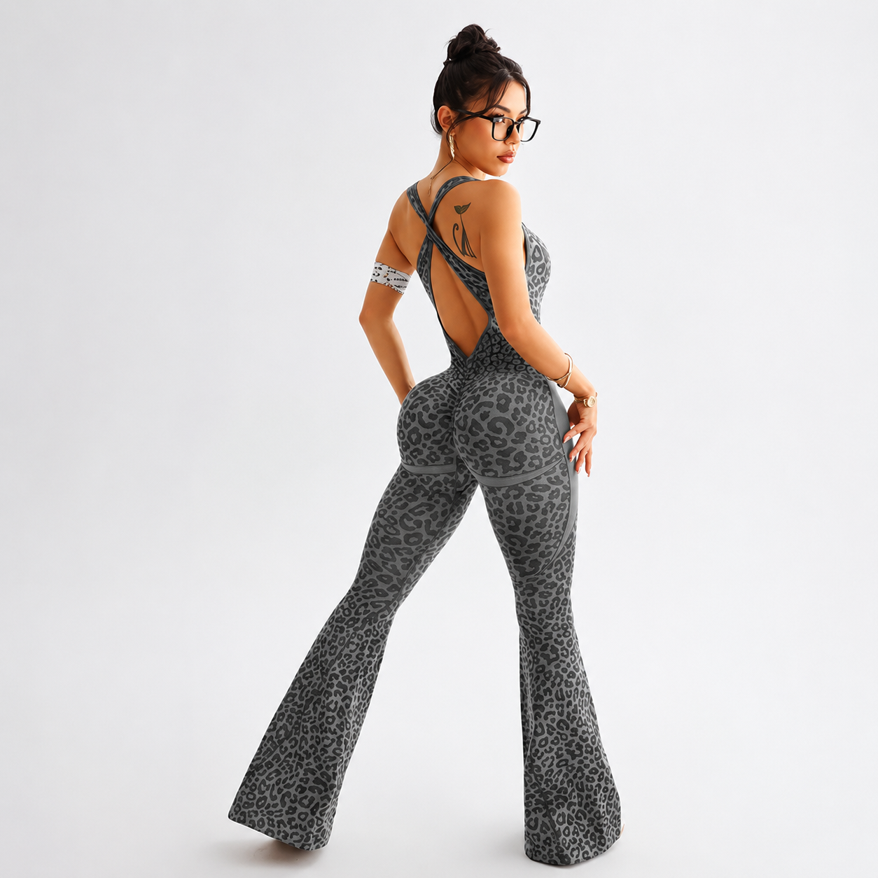Leopard Print Flared Sports Jumpsuit With Cross Back Design For Women