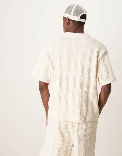 boxy relaxed polo in heavyweight cream cable texture