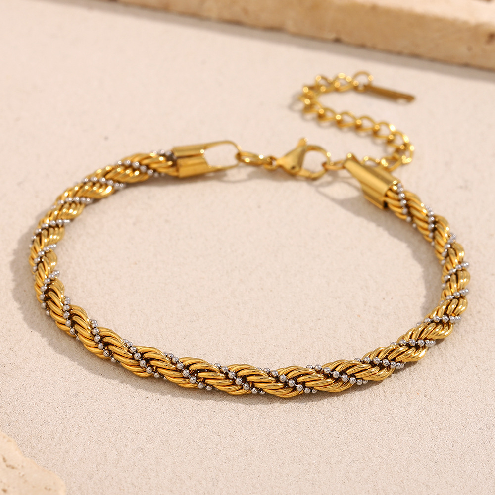 Vacuum electroplated titanium steel braided chain bracelet with twisted design