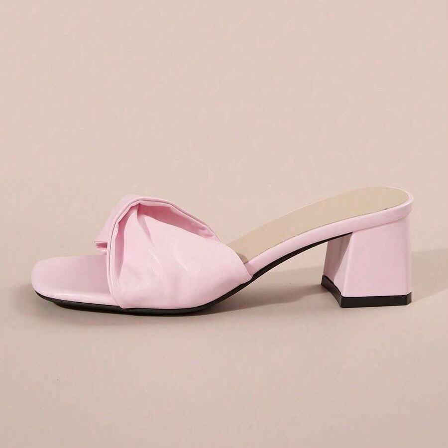 Twist Knot Block Mid Heel Sandals in Golden - Heel Detail