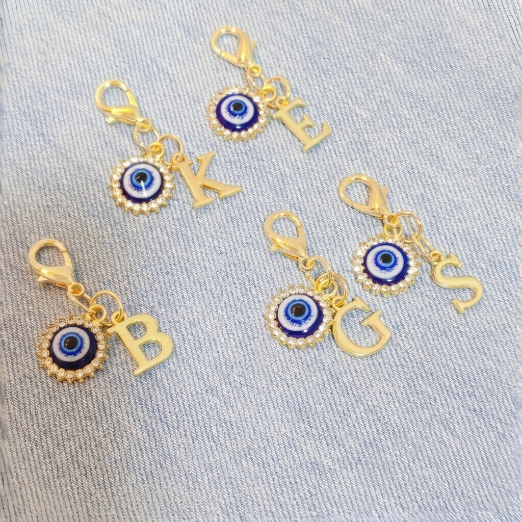 Celestial Themed Keychain With Sun Moon And Pendant Accents
