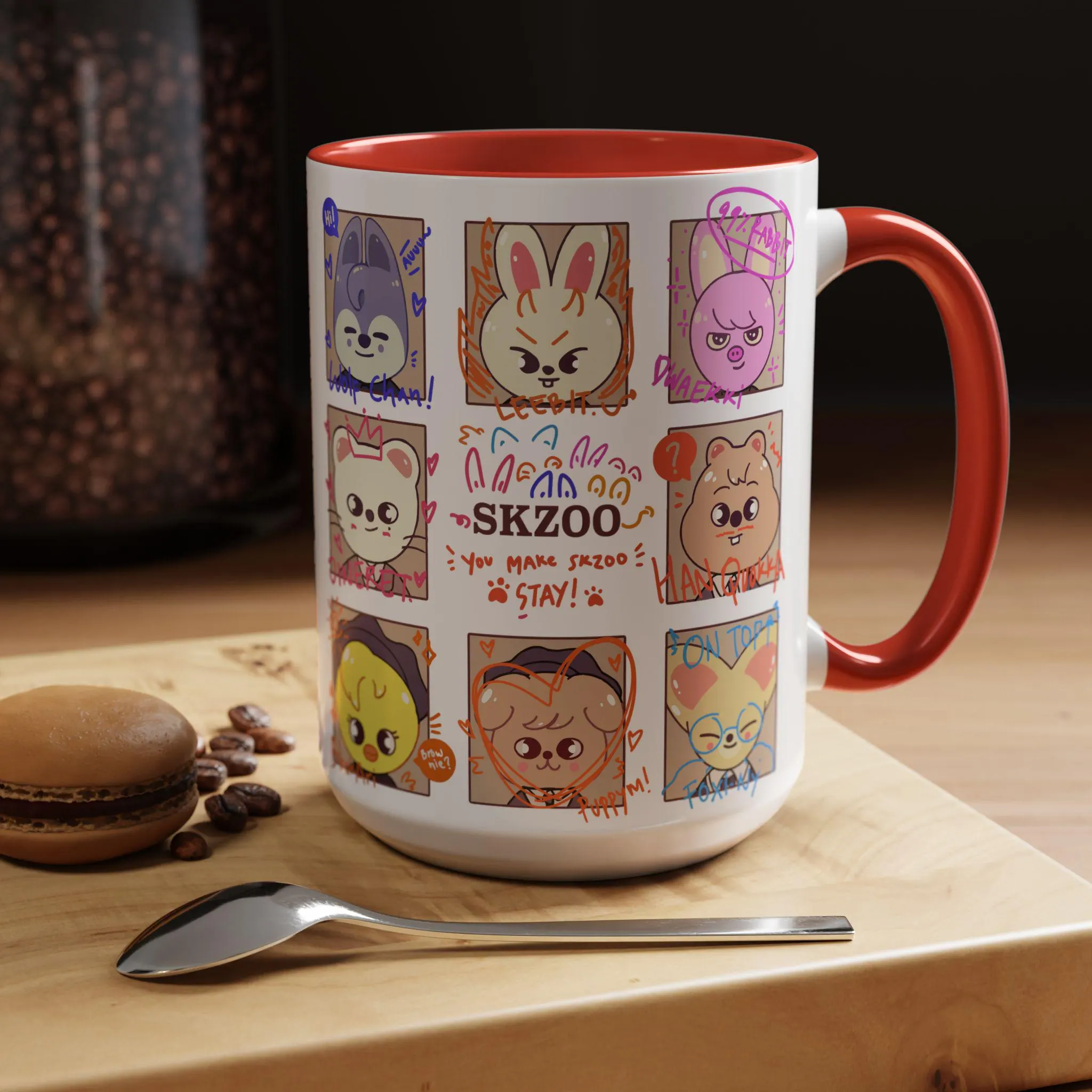 White ceramic mug featuring Skzoo cartoon animal characters with red rim and handle