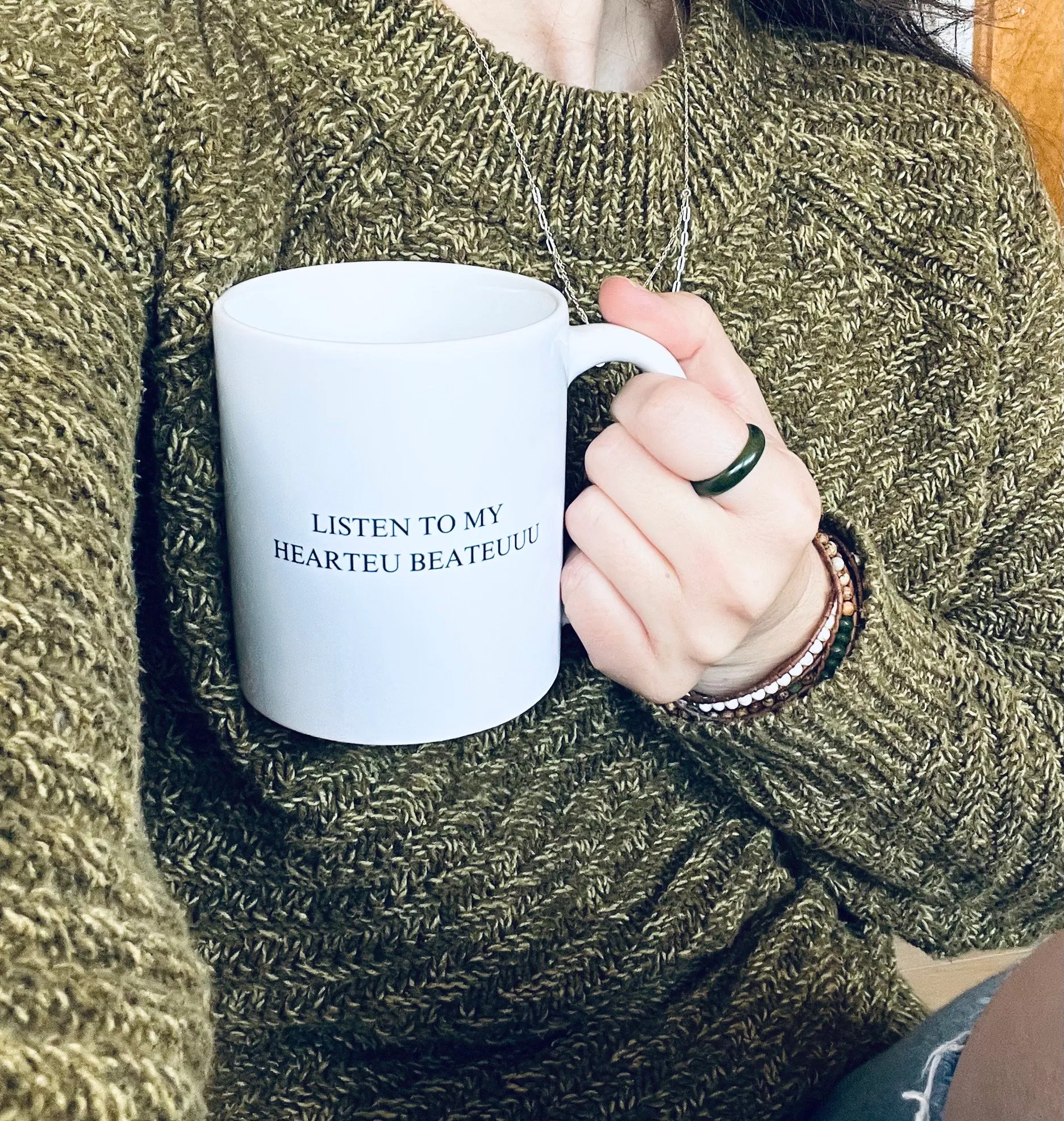 White ceramic mug with navy blue text reading Listen To My Hearteu Beateuuu inspired by Changbin from Stray Kids