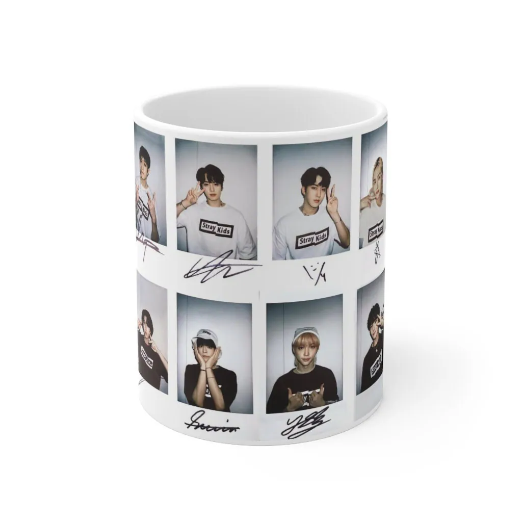 White ceramic mug featuring Stray Kids member polaroid photos and printed signatures