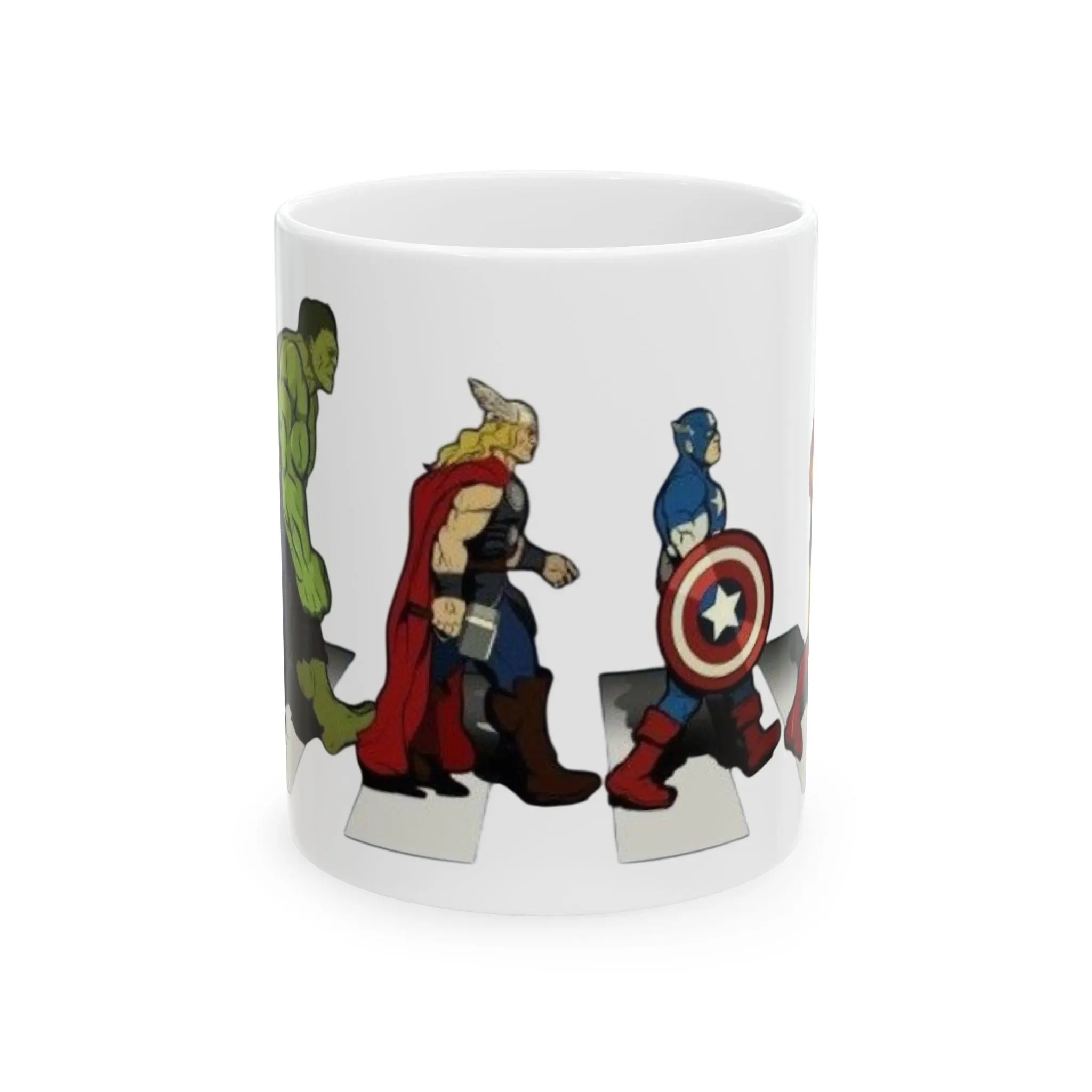 White ceramic mug featuring Hulk Thor and Captain America walking across a crosswalk design