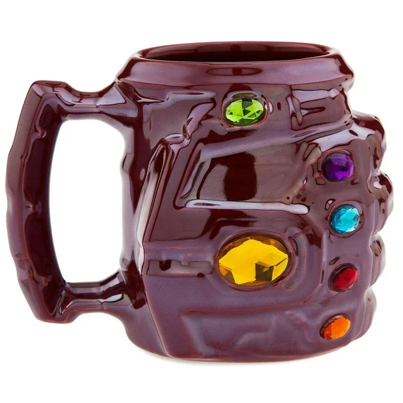 Sculpted ceramic mug shaped like the Iron Man Nano Gauntlet with faceted gems and sixteen ounce capacity