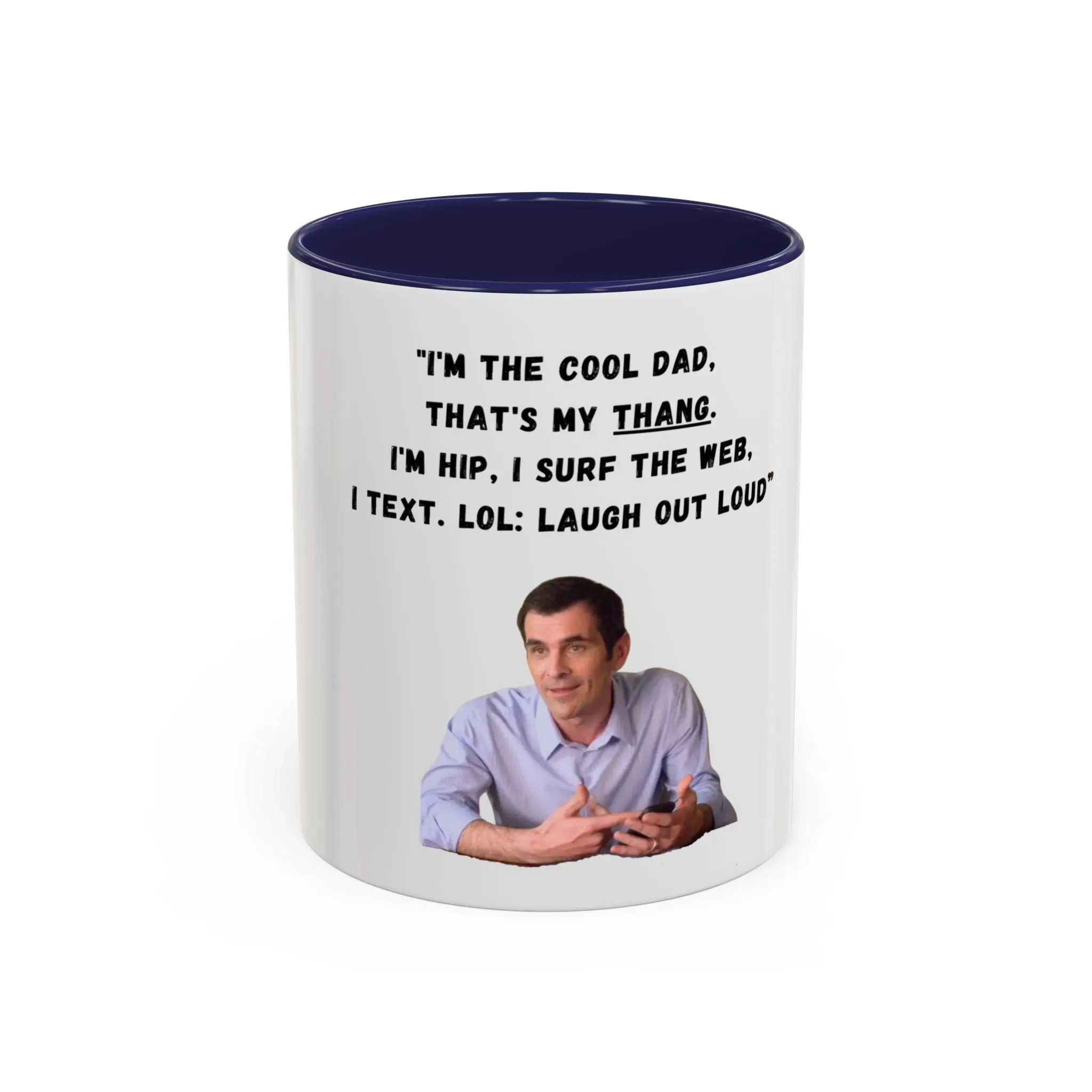 White ceramic mug featuring Phil Dunphy and his cool dad quote with navy blue interior and rim