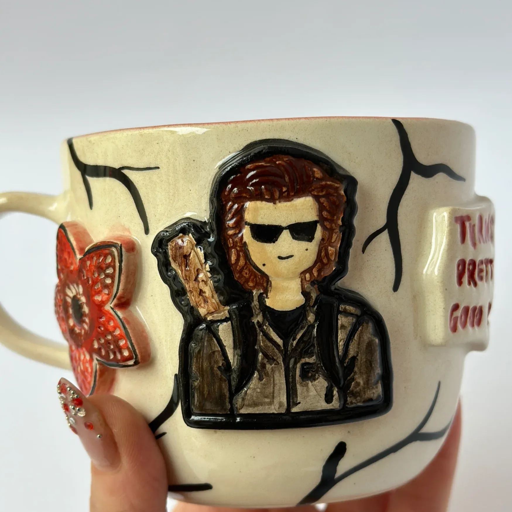 Handmade Ceramic Mug With Sculpted Mystery Figure Design