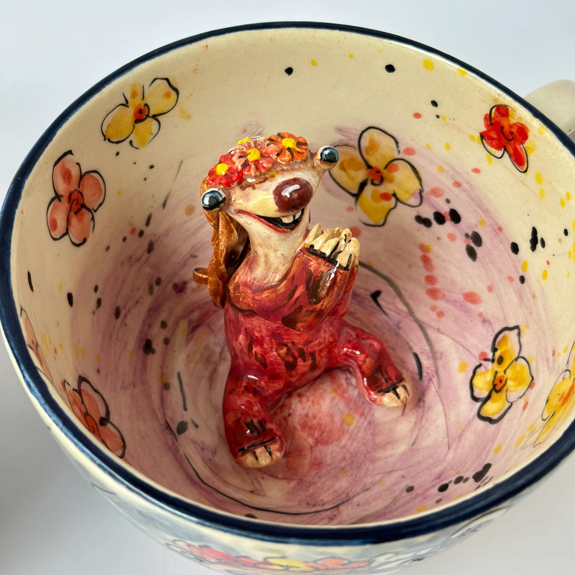 Handmade ceramic sloth character mug for coffee and tea